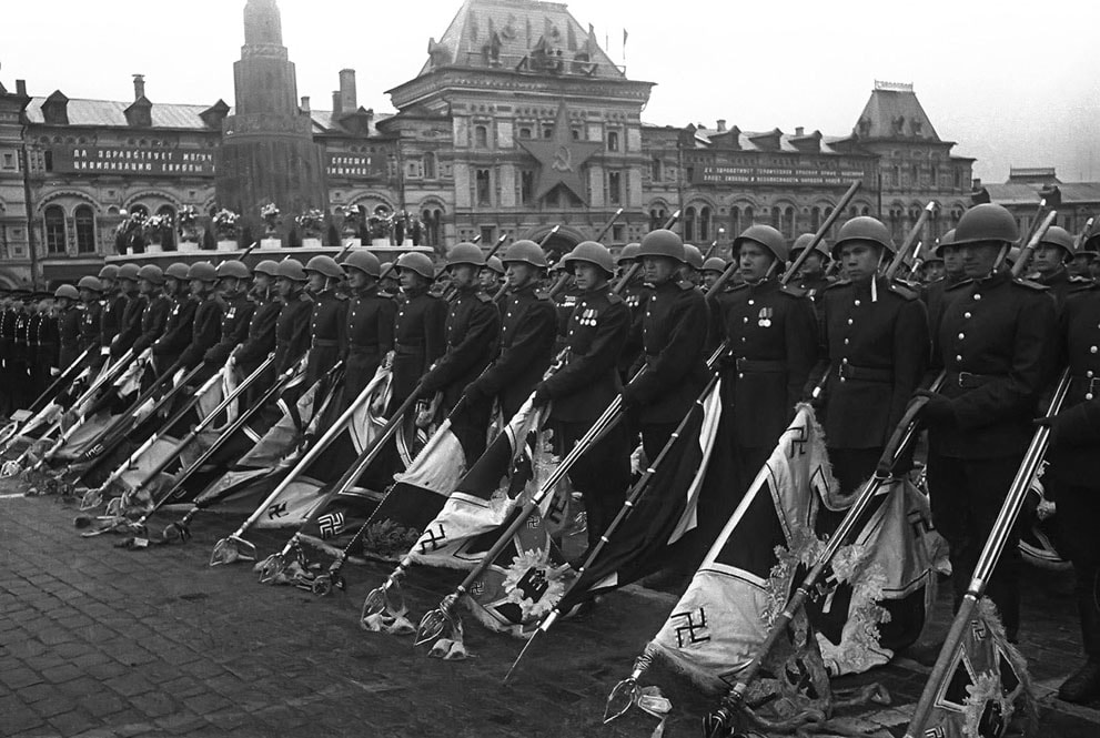 Soviet soldiers with lowered standards of the defeated Nazi forces